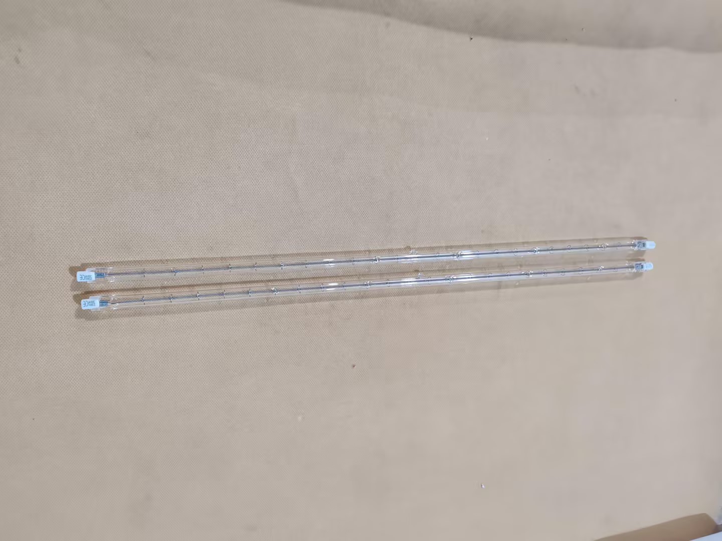 Optimizing Thermal Flux with Parabolic Reflectors for Infrared Halogen Lamps